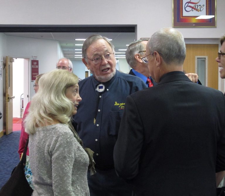 U.S. Rep. Don Young, center, and his fiancee, Anne Garland Walton, left, speak to others during 