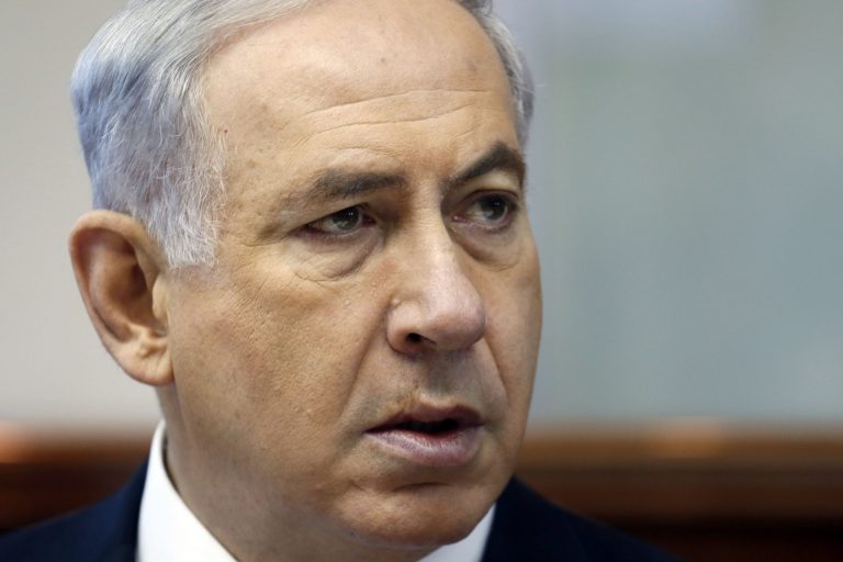 Israeli Prime Minister Benjamin Netanyahu chairs the weekly cabinet meeting in his office in Jerusalem, Sunday, July 6, 2014. Prime Minister Benjamin Netanyahu on Sunday said Israel would act calmly and responsibly in the face of rising Israeli-Palestinian hostilities, just hours after Israel's military carried out airstrikes on 10 sites in the Gaza Strip. (AP Photo/Gali Tibbon, Pool)