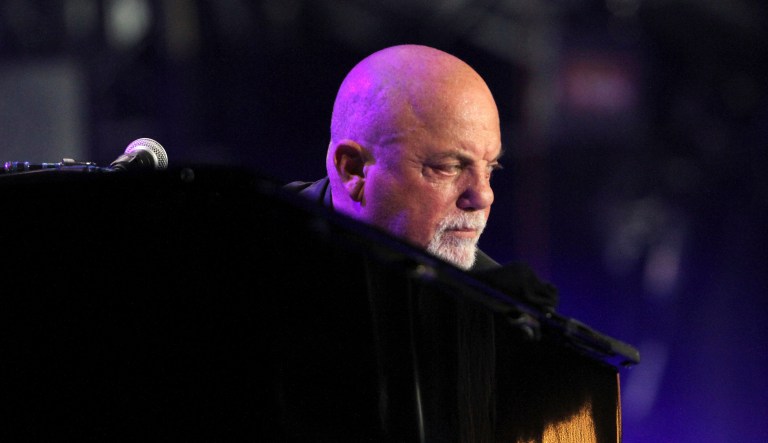 Billy Joel wore a yellow Star of David at his concert Monday night at New York City's Madison Square Garden, more than a week after a white supremacist rally in Charlottesville, Va. left one woman dead. (Photo by Robb Cohen/Invision/AP)