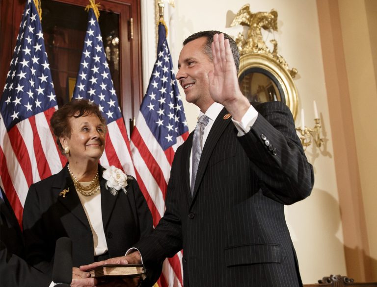 Newly elected Republican Rep. David Jolly of Florida, right, poses for a ceremonial swearing-in with his mother Judy on March 13. Jolly edged out Democrat Alex Sink in a special election that Republicans cast as a referendum on President Barack Obama and his unpopular health care law. (AP Photo/J. Scott Applewhite)