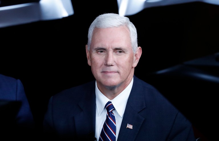 Republican vice-presidential nominee Mike Pence disregarded past tweets by Donald Trump on Chinese pushing climate change as an issue. (AP Photo/Mary Altaffer)