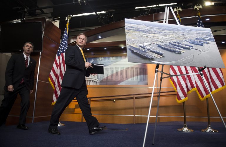 Rep. Robert Wittman, R-Va., and Rep. Randy Forbes, R-Va., hold a news conference in the Capitol on President Obama's remarks to defense industry workers about the sequester in Virginia on Feb. 26, 2013. (CQ Roll Call via AP Images)