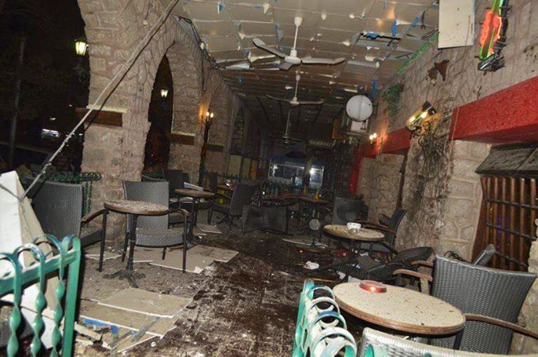 The interior of the La Chaumiere restaurant which was the scene of a Saturday night attack, in the capital Djibouti city, Djibouti on Sunday, May 25, 2014. The European Union Naval Force and the African Union on Sunday both condemned an attack the government said involved two Somali suicide bombers in the tiny East African nation of Djibouti.  At least three people were killed, including a male and female suicide bomber, and over a dozen wounded in an attack on a restaurant popular with Westerners in central Djibouti, local media said today.  (AP Photo)