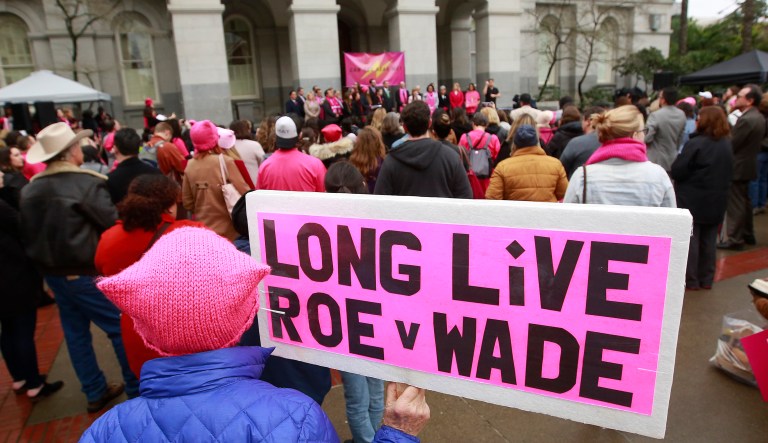 Pat Thompson displayed a sign supporting Roe v. Wade at a rally, held by Planned Parenthood, commemorating the 45th anniversary of the landmark Supreme Court decision at the Capitol Monday, Jan. 22, 2018, in Sacramento, Calif. The 1973 landmark decision by the United States Supreme Court affirmed a woman's right to have an abortion.