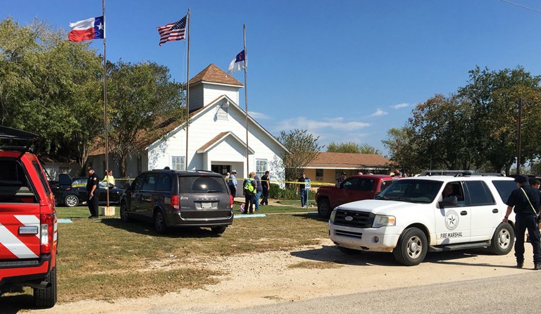 Emergency personnel respond to a fatal shooting at a Baptist church in Sutherland Springs, Texas, Sunday, Nov. 5, 2017. (KSAT via AP)