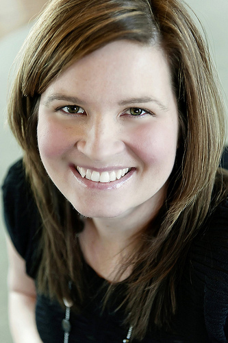 In this Jan. 9, 2011 photo, Andrea Deckard poses for a photo, in Cincinnati. Deckard, who left a corporate job to become a stay-at-home mom in suburban Monroe because of family needs, started her Savings Lifestyle online site during the recession to help people find discounts, freebies and make household changes to stretch their budgets. (AP Photo/Belle & Blanc, Neysa Ruhl)