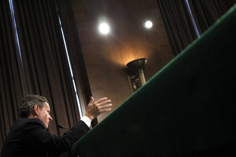   FILE - In this Thursday, July 26, 2012, file photo,Treasury Secretary Timothy Geithner testifies on Capitol Hill in Washington, before the Senate Banking Committee hearing: 