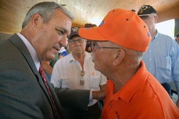 House Committee on Veterans Affairs Chairman Rep. Jeff Miller, R-Florida, left, talks with veteran George White during a July 13, 2012, rally in support of a new Veterans Hospital in Kingston, Tenn.  (AP Photo/Bob Fowler, Knoxville News Sentinel)