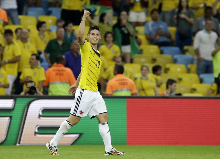 Colombia's James Rodriguez celebrates after scoring his side's second goal during the World Cup round of 16 soccer match between Colombia and Uruguay at the Maracana Stadium in Rio de Janeiro, Brazil, Saturday, June 28, 2014. (AP Photo/Matt Dunham)