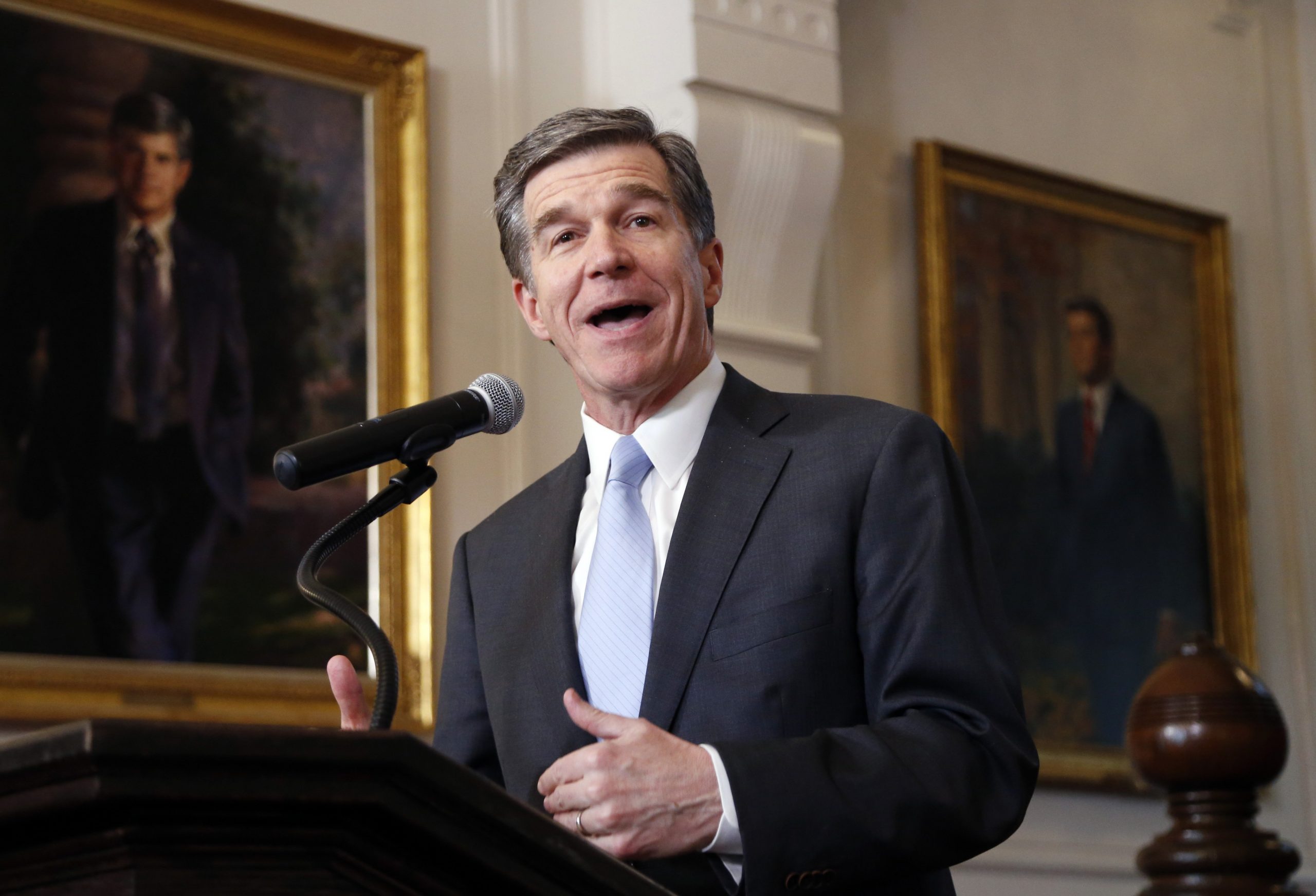 North Carolina Gov. Roy Cooper signs measure rolling back ‘bathroom bill’ despite criticism from LGBT groups
