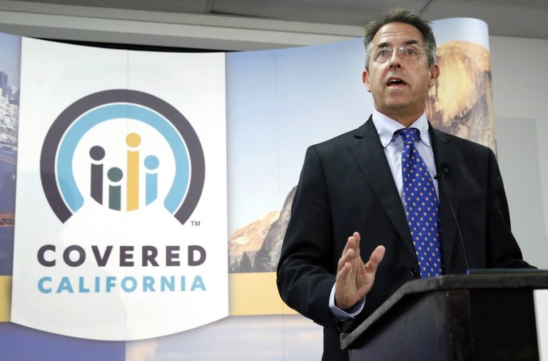 FILE - In this Nov. 13, 2013 file photo, Peter Lee, executive director of Covered California, the state's health insurance exchange, talks at a news conference in Sacramento, Calif. Long before it opened its doors to the public last fall, California's health insurance exchange awarded a small contract to a business consultant, Leesa Tori, for her advice on designing a program to sell insurance to small companies The industry veteran was a friend and former co-worker of Peter Lee, the exchange's top executive. The seemingly minor deal would mark the beginning of a lucrative and far-reaching partnership between the new state agency and the boutique consulting company Tori formed last year, just as national health care reform took root across the U.S.  (AP Photo/Rich Pedroncelli, File)