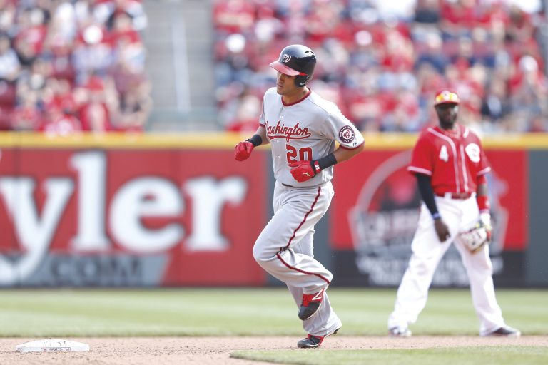 Joe Robbins/Getty Images
Ian Desmond made two errors that allowed the Reds to get back into it, but the shortstop homered in the 11th to help the Nationals win at Great American Ball Park.