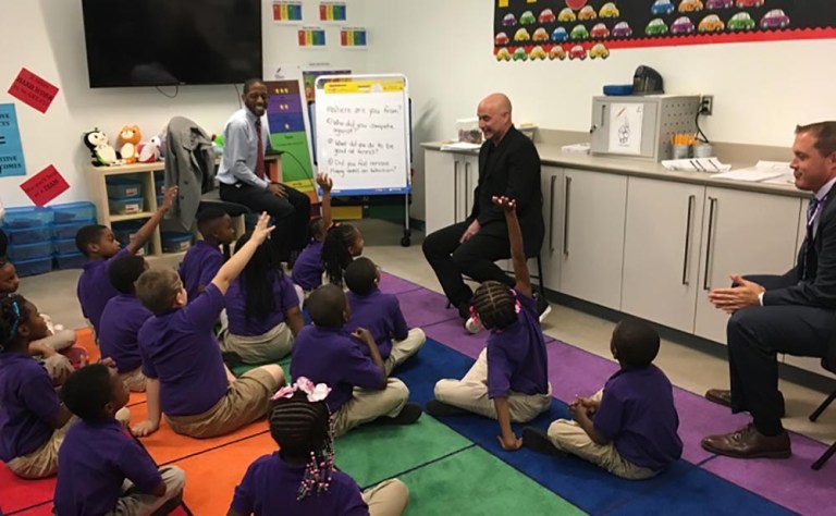 Andre Agassi speaks to second-graders on Tuesday at Rocketship Rise Academy in Washington. (Jason Russell/Washington Examiner)