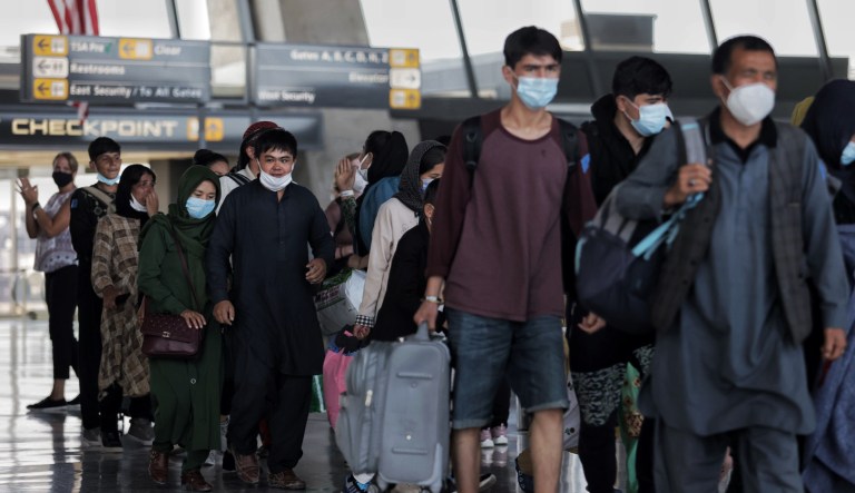 Afghan refugees arrive.