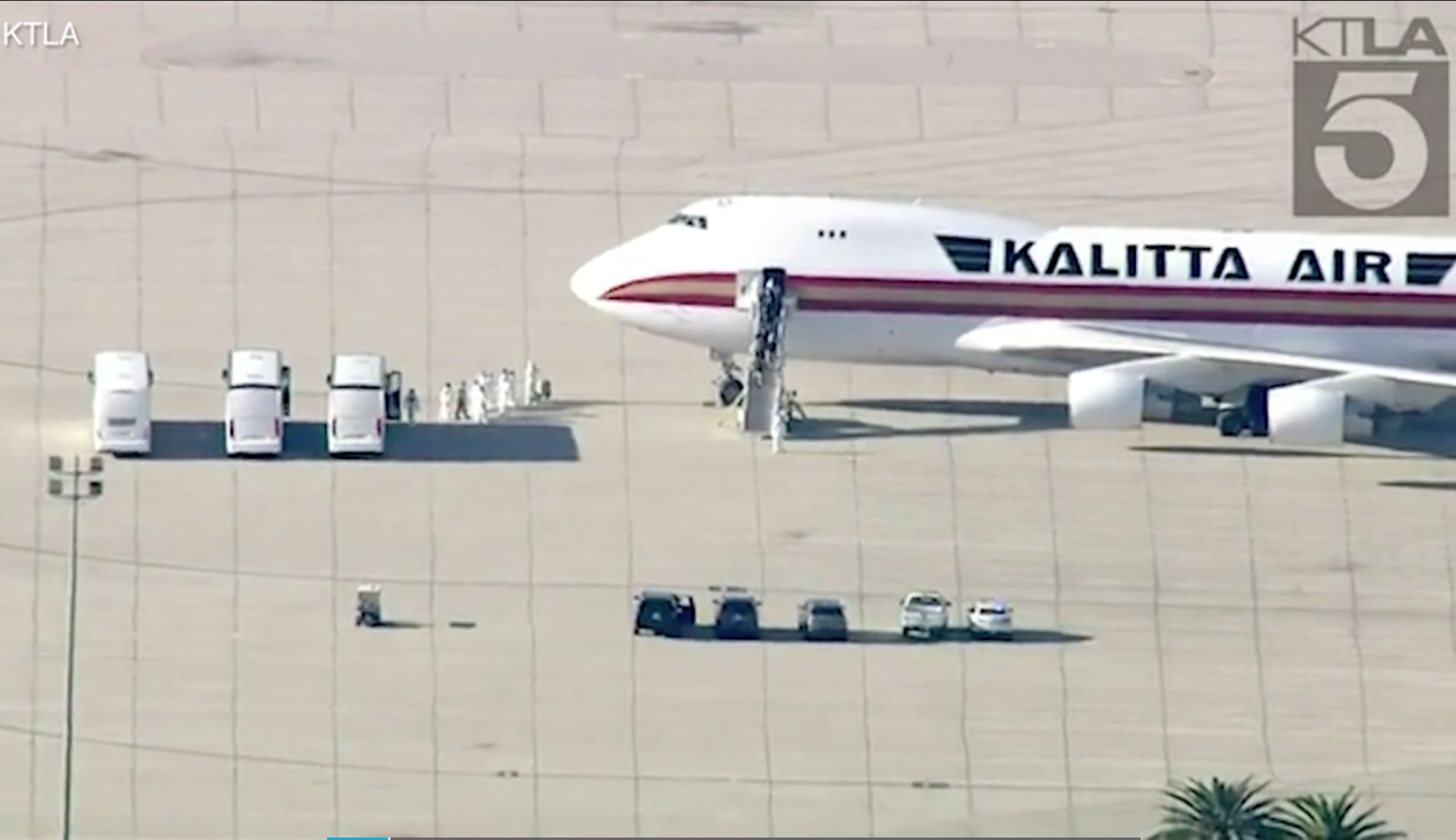 WATCH: American evacuees from Wuhan met by officials in hazmat suits in California