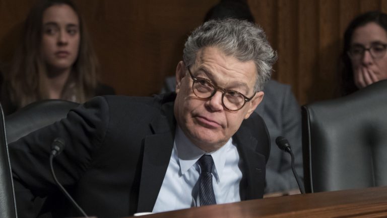 Sen. Al Franken, D-Minn., who said last week he'll step down in the coming weeks due to mounting allegations of sexual misconduct, listens to Sen. Michael Bennet, D-Colo., as he attends a hearing of the Senate Health, Education, Labor, and Pensions Committee, on Capitol Hill in Washington, Tuesday, Dec. 12, 2017.