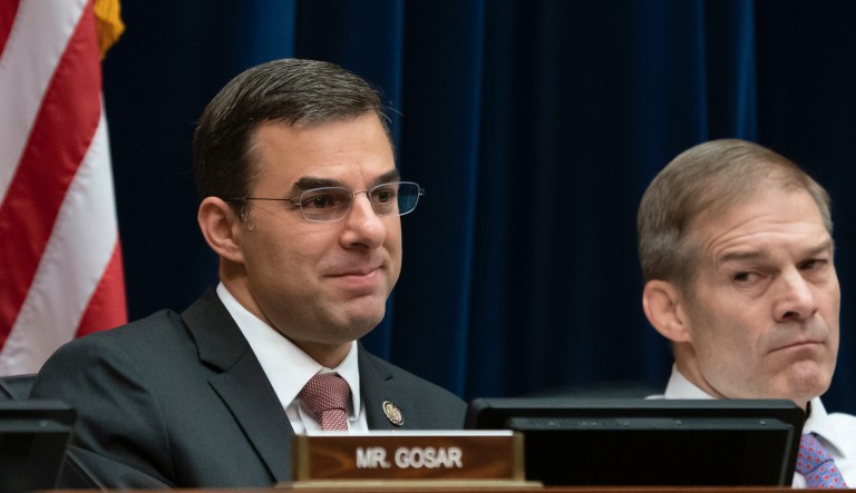 Rep. Justin Amash, R-Mich., center, is joined by, from left, Sen. Ron Wyden, D-Ore., Rep. Thomas Massie, R-Ky., and Rep. Ralph Norman, R-S.C., as he hosts a news conference with a bipartisan group of House and Senate lawmakers who are demanding the U.S. government should be required to seek warrants if it wants to search for information about Americans and insist on reforms to the FISA Amendments Reauthorization Act of 2017 to protect Americans' rights, at the Capitol in Washington, Wednesday, Jan. 10, 2018.