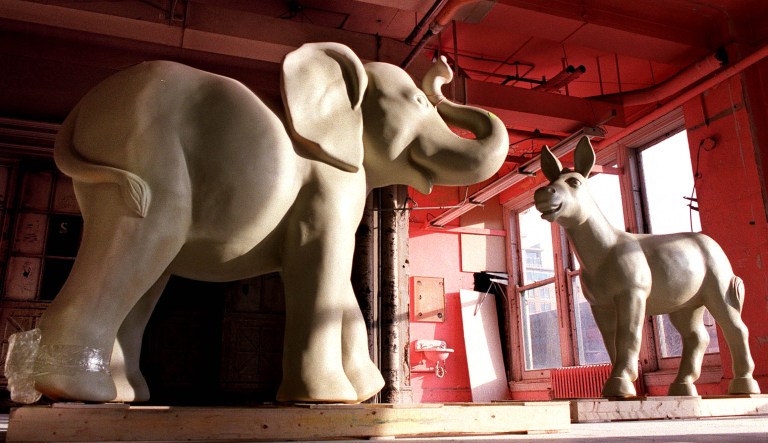 Sculptures of a Republican elephant and a Democratic donkey are shown.