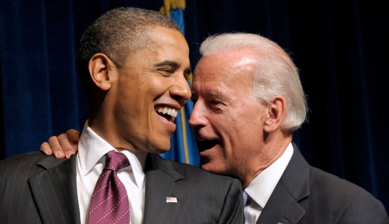 President Barack Obama shares a laugh with Vice President Joe Biden after he was introduced at a fundraiser for Delaware Democratic Senate candidate Chris Coons, Friday, Oct.  15, 2010, at the Grand Opera House in Wilmington, Del. 