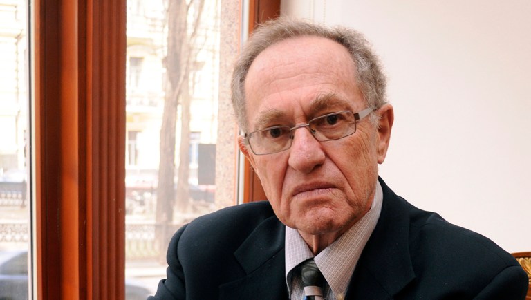 FILE - This April 11, 2011 file photo shows attorney Alan Dershowitz at a hotel  in Kiev, Ukraine, where he was preparing to defend former Ukrainian president Leonid Kuchma, who was accused in the murder of an investigative journalist more than 10 years ago. The papers of the prominent lawyer and author are now available to researchers at Dershowitz's alma mater, Brooklyn College. Dershowitz donated his papers to Brooklyn College rather than Harvard, where he is a professor.