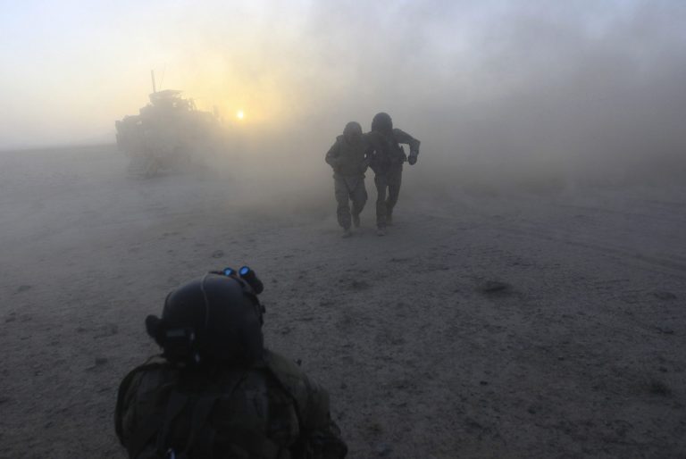 U.S. Marines stand guard during the change of command ceremony at Task Force Southwest.