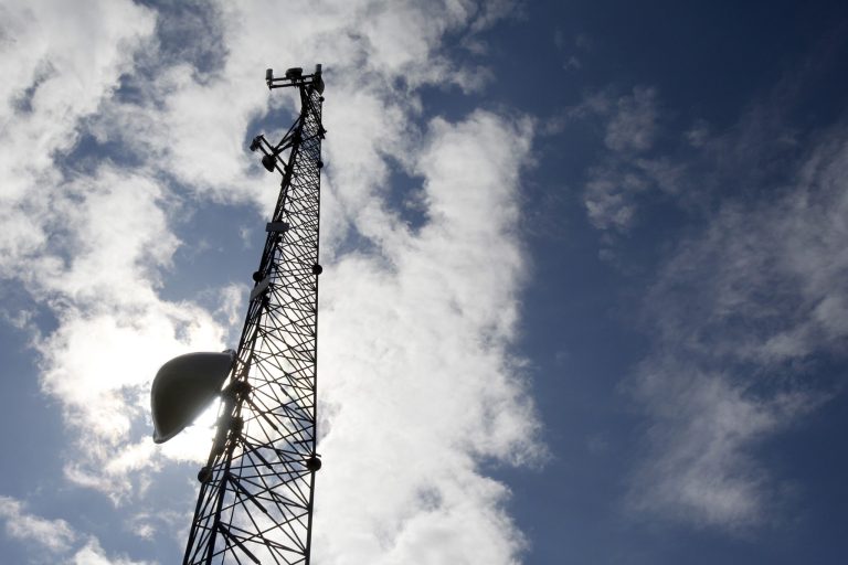 In this photo from 2012, a broadband tower rises into the sky in Plainfield, Vt.