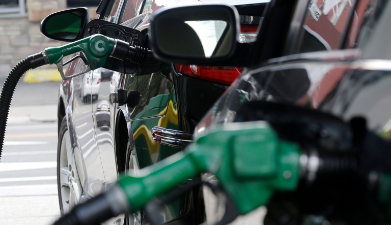 Gas is pumped into vehicles at a BP gas station in Hoboken, N.J.