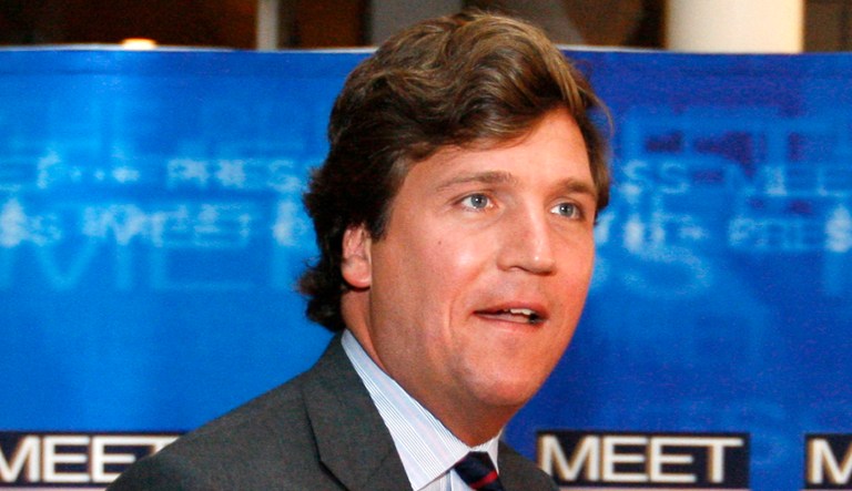 In this Nov. 17, 2007 file photo, political commentator Tucker Carlson arrives for the 60th anniversary celebration of NBC's Meet the Press at the Newseum in Washington.