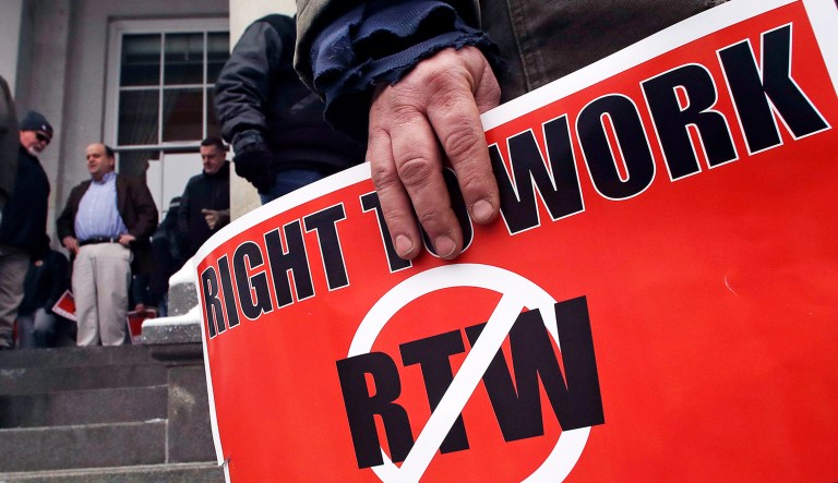Workers International Union of Bricklayers and Allied Craftworkers Local 3 protest outside the State House in advance of voting on right to work legislation in Concord, N.H.