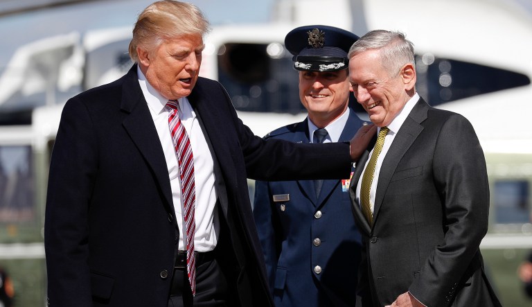 President Donald Trump is greeted by Defense Secretary James Mattis before they boarded Air Force One at Andrews Air Force Base, Md., Thursday, March 2, 2017. Trump is traveling Virginia to meet with sailors and shipbuilders on Gerald R. Ford CVN 78 aircraft carrier, a $12.9 billion warship, that is expected to be commissioned this year after cost overruns and delays.