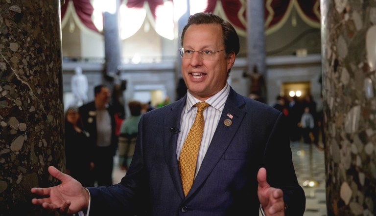 Rep. Dave Brat, R-Va., a member of the conservative Freedom Caucus, explains his position to a TV interviewer on Capitol Hill in Washington.