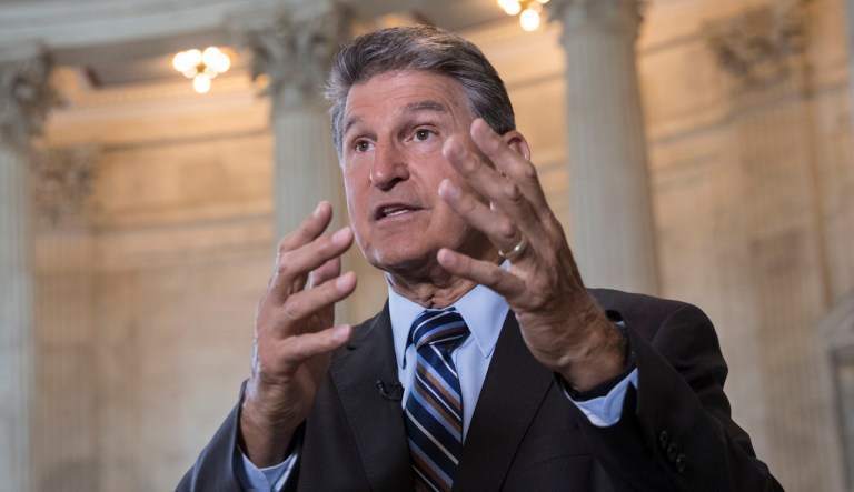 Sen. Joe Manchin, D-W.Va., responds to questions during a TV news interview on Capitol Hill in Washington, D.C.