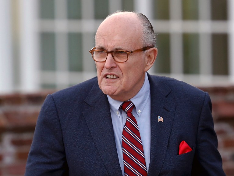 This Nov. 20, 2016 file photo shows former New York Mayor Rudy Giuliani arriving at the Trump National Golf Club Bedminster clubhouse in Bedminster, N.J. Giuliani was rushed to the hospital for emergency surgery over the weekend after falling while on vacation on Long Island on Sunday, Aug. 13, 2017. 