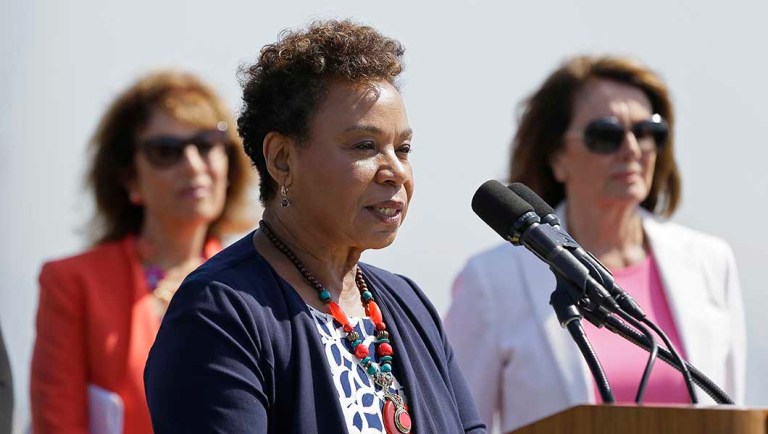 Rep. Barbara Lee, center, speaks during an event to commemorate Women's Equality Day.
