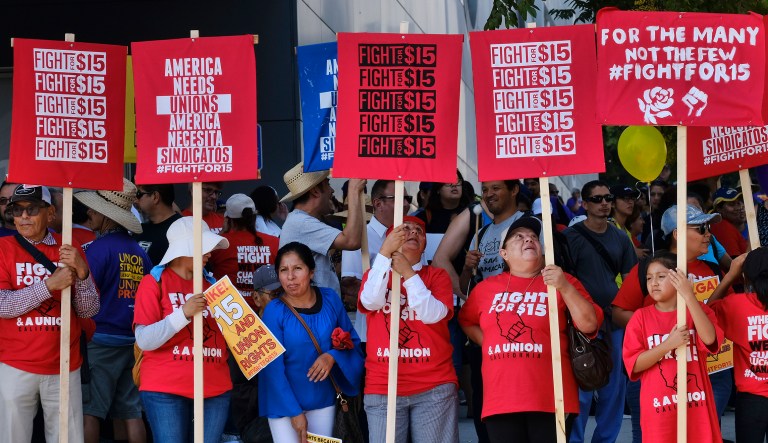 Union workers and minimum wage activists gather for a Labor Day rally in downtown Los Angeles.