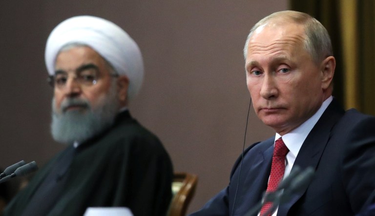 Russia's President Vladimir Putin and Iran's President Hassan Rouhani attend a news conference in Russia's Black Sea resort of Sochi on Nov. 22, 2017.