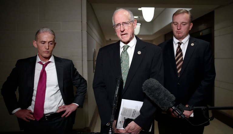 House Intelligence Committee member Rep. Mike Conaway, R-Texas, center, joined by Rep. Tom Rooney, R-Fla., right, and Rep. Trey Gowdy, R-S.C., left, speaks to media after a House Intelligence Committee meeting. (AP Photo/Carolyn Kaster)