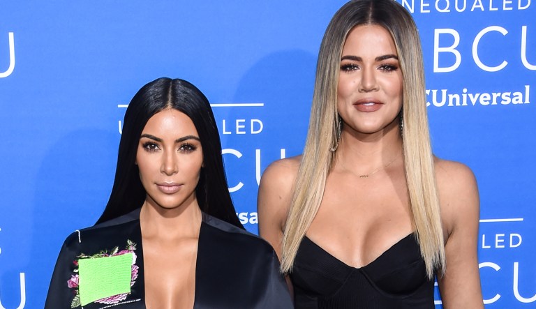 FILE - In this May 15, 2017, file photo, television personalities Kim Kardashian West, left, and Khloe Kardashian attend the NBCUniversal Network 2017 Upfront at Radio City Music Hall in New York. The Kardashians of âKeeping up with the Kardashiansâ are in the middle of a baby boom. The latest baby bombshell came from sister Khloe Kardashian, who announced a few days before Christmas on Instagram that sheâs expecting her first with boyfriend basketball star Tristan Thompson. Kim Kardashian West, meanwhile, is awaiting her third with hubby Kanye West via surrogate.