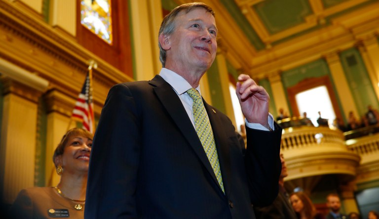 Term-limited Colorado Gov. John Hickenlooper leaves the dais after delivering his final State of the State address to a joint assembly Thursday, Jan. 11, 2018, in the State Capitol in Denver. Hickenlooper encouraged lawmakers to take steps to improve the state's crumbling roadways and to commit to education efforts to prepare the populous for jobs in the ever-changing economy.