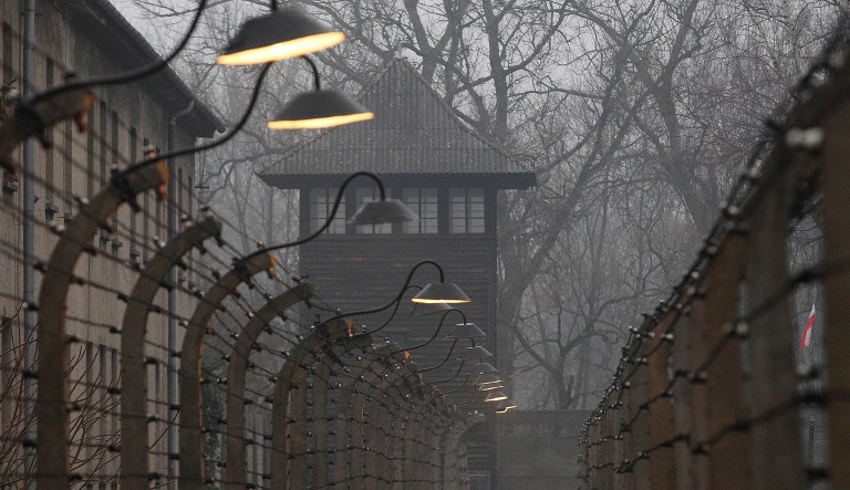 Barbed wire fences are pictured at the former Nazi German concentration and extermination camp Auschwitz  on the International Holocaust Remembrance Day in Oswiecim, Poland, Saturday, Jan. 27, 2018.  