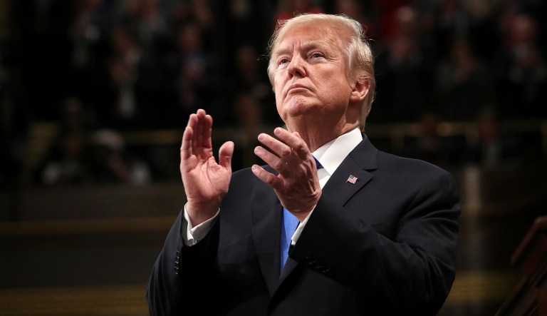 President Trump claps during the State of the Union address in the House chamber of the U.S. Capitol to a joint session of Congress Tuesday, Jan. 30, 2018 in Washington. 