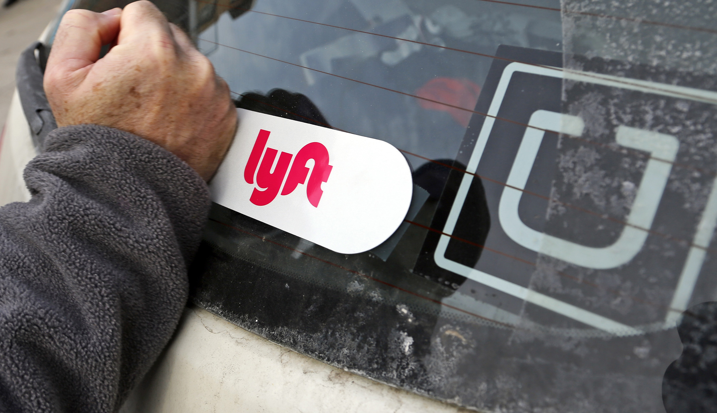 Uber, Lyft drivers stage nationwide strike for higher pay
