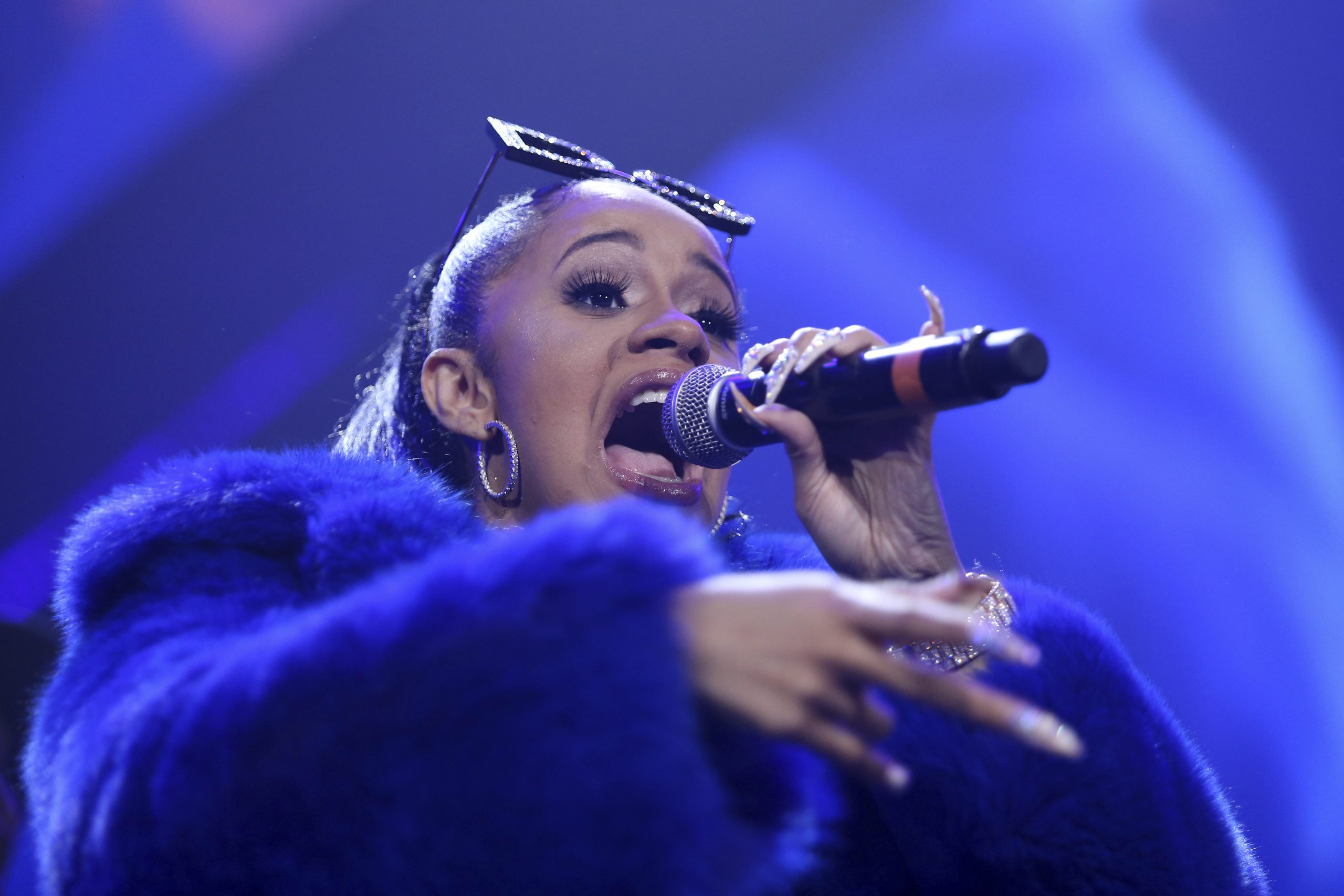 Cardi B threatens to ‘dog walk’ Tomi Lahren in Twitter fight over government shutdown
