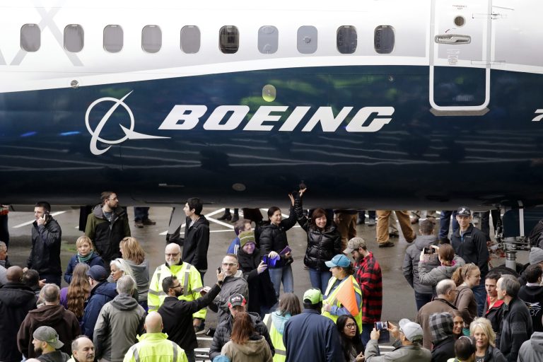 A Boeing 737 MAX 7, the newest version of Boeing's fastest-selling airplane, is displayed during a debut for employees and media of the new jet Monday, Feb. 5, 2018, in Renton, Wash. The company says that the airplane improves on the design of its predecessor, the 737-700, with more capability, range and seats. Following upcoming flight tests, it is expected to be delivered to airline customers beginning in 2019.