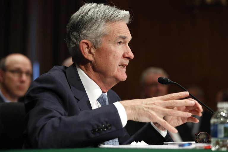 Federal Reserve Chairman Jerome Powell gives a testimony at a hearing.