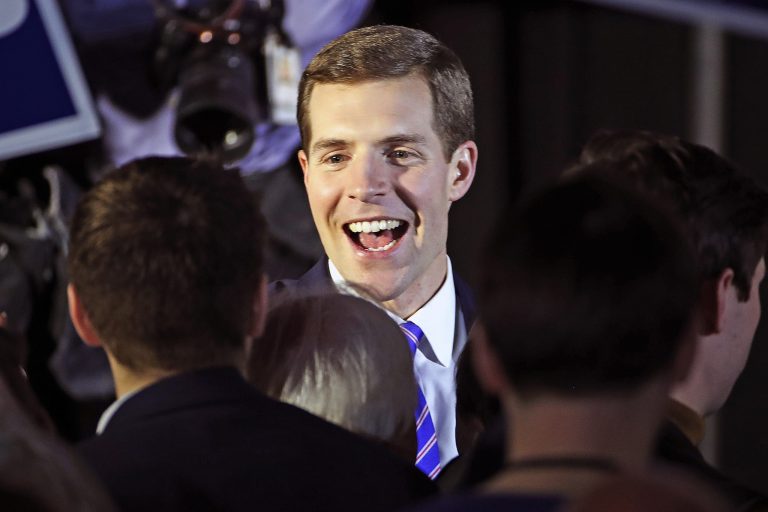 Conor Lamb, the Democratic candidate for the March 13 special election in the 18th Congressional District of Pennsylvania, center, is pictured at his election night party in Canonsburg, Pa., early on Wednesday.