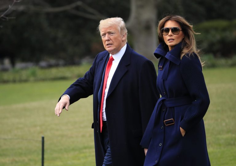 President Trump and his wife, Melania, walk on the South Lawn of the White House.