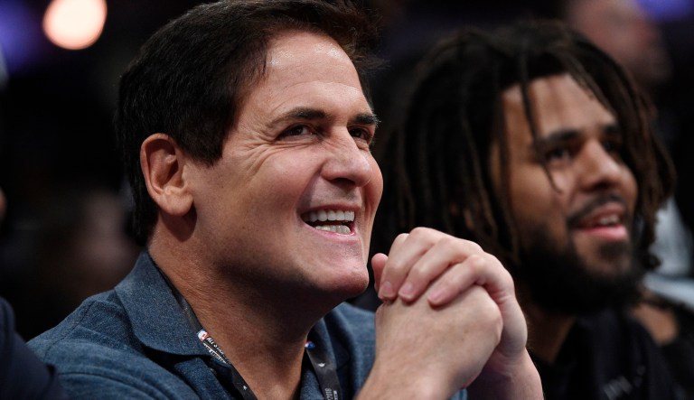 FILE - In this Saturday, Feb. 17, 2018 file photo, Dallas Mavericks owner Mark Cuban watches from the crowd during NBA All-Star Saturday in Los Angeles. When the Dallas owner went on Hall of Famer Julius Ervingâs podcast in February and said he told his players that "losing is our best option," the league fined him $600,000 for "public statements detrimental to the NBA." That put a spotlight on the Mavericks. So if they were planning on packing it in and trying to add more young legs in the draft for Nowitzki's expected swan song, suddenly they had to change plans.