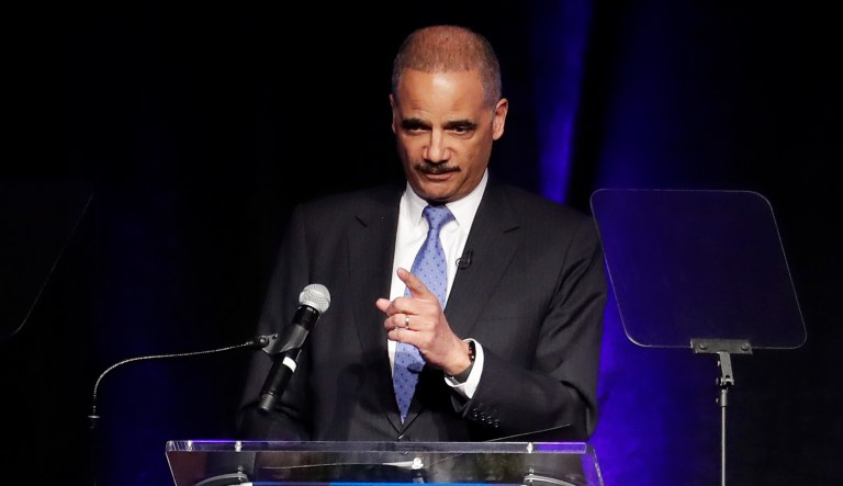 Former Attorney General Eric Holder speaks at an event.