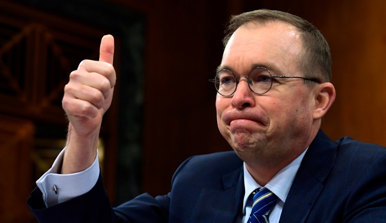 FILE - In this Tuesday, Feb. 13, 2018, file photo, budget director Mick Mulvaney testifies before the Senate Budget Committee on Capitol Hill in Washington, on President Donald Trump's fiscal year 2019 budget proposal. Documents obtained by The Associated Press show that Mulvaney, Trump's appointee to oversee the Consumer Financial Protection Bureau, has given big pay raises to the deputies he hired to help him run the bureau. 